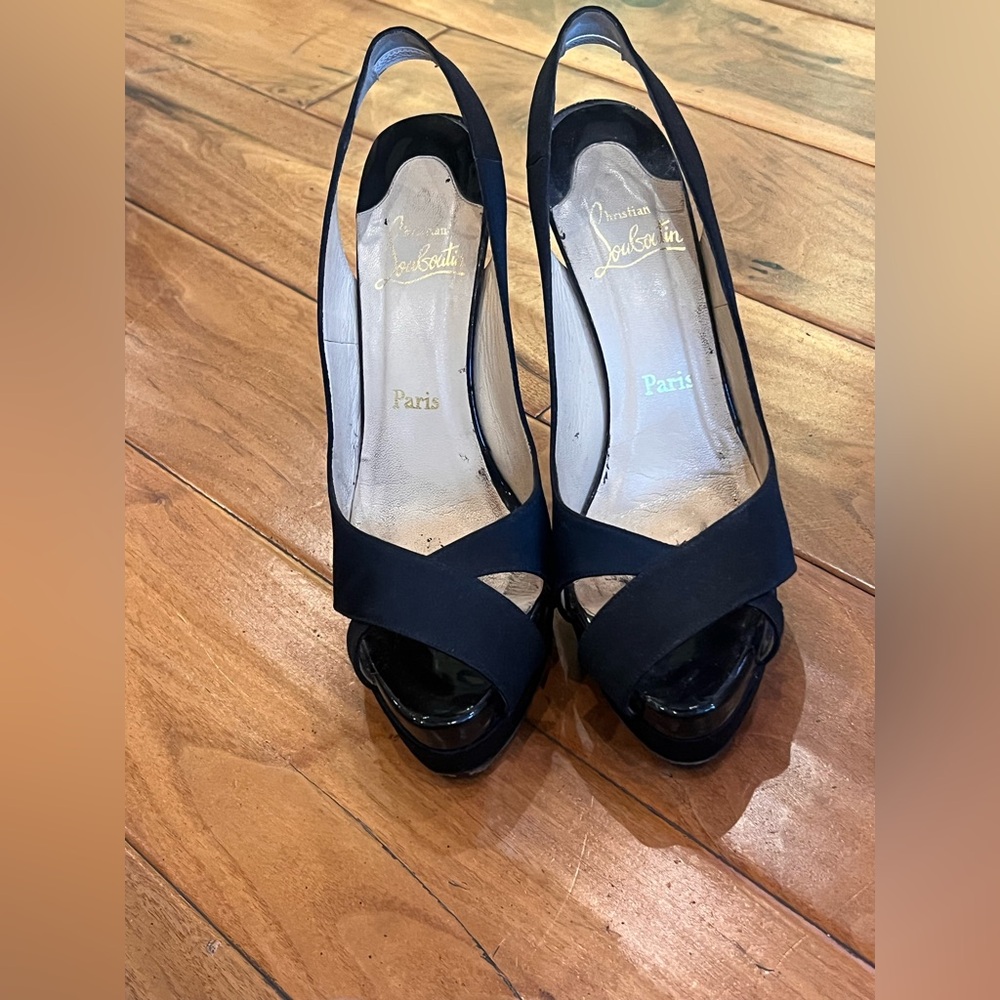 Christian Louboutin Black Women's Shoes with crisscross detail on the font